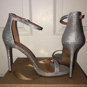 Brand new sparkly, silver heels. 3 1/2” to 4”.